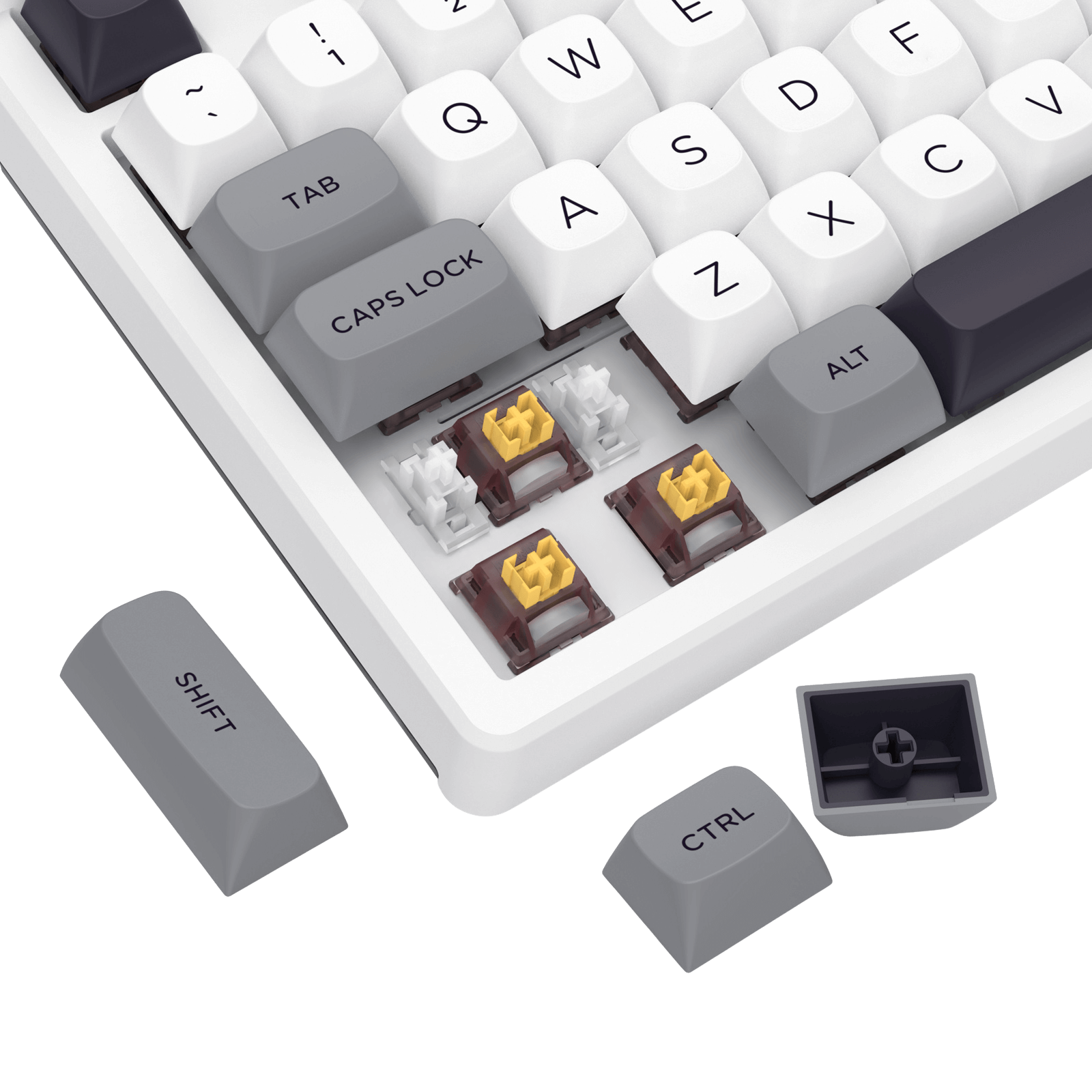 Close-up of a mechanical keyboard with white keycaps and gold accents on a black background.